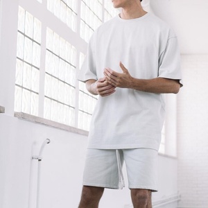 Ensemble de survêtement en coton blanc pour hommes, manches courtes, col rond, couleur unie, décontracté, short d'été, coupe ample, léger et respirant - Product Image 2