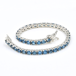 Bracelet tennis unisexe de haute qualité en argent sterling 925 avec topaze bleue de Londres naturelle ovale certifiée IGI, idéal pour les soirées - Product Image 1