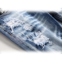 Vente en gros de jeans en denim pour hommes de style rugueux pantalon d'été bleu à la mode pantalon extensible pour hommes de style rugueux coupe ajustée