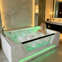 Baignoire de massage à remous pour deux personnes avec fenêtre latérale transparente, éclairage LED coloré et cascade, baignoire de trempage intérieure