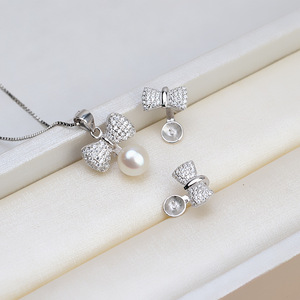 Ensemble de pendentifs pour oreilles en argent S925 tendance DIY européen-américain, nouveaux bijoux à nœud pour femmes, composants de bijoux vides en perles - Product Image 1