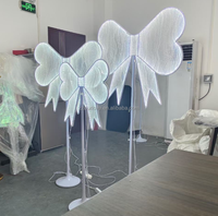 2024 Ailes de papillon de lumière d'arc de décoration de mariage de style Offre Spéciale de LED