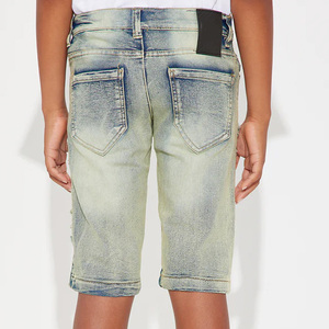 กางเกงยีนส์ขาสั้นเด็กผู้ชายพร้อมออกแบบโลโก้ตามสั่ง เนื้อผ้าทนทาน ดีไซน์ทันสมัย เหมาะสำหรับใส่ลำลองและเล่นกลางแจ้ง - Product Image 4