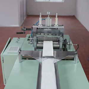 Máquina para enrollar almohadillas de compresión - Product Image 4