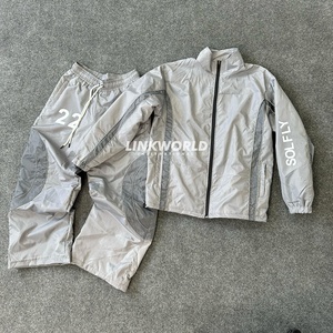 Ensemble de coupe-vent personnalisable pour hommes Survêtement deux pièces à fermeture éclair des fabricants Respirant Réfléchissant Jogging Polyester Hiver - Product Image 1