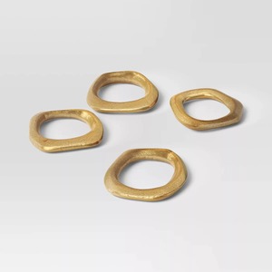 Ensemble de 4 anneaux de serviette en métal doré modernes, décor de table géométrique sculptural - Product Image 1