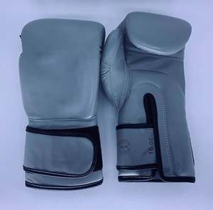 Guantes de Boxeo Profesionales OEM con Logotipo Personalizado, de Cuero, para Entrenamiento, Sparring, MMA, Kickboxing, Muay Thai, Venta al Por Mayor, Calidad de Exportación - Product Image 1