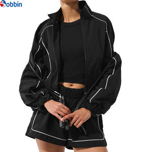 Ensemble court coupe-vent pour femme, nouveau modèle tendance unisexe, ensemble court coupe-vent en nylon personnalisé avec fermeture éclair pour femme, élastique et imperméable - Product Image 1