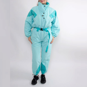 Combinaison de ski pour femme, bleu clair, à blocs de couleur, avec col montant et taille ceinturée, imperméable, une pièce, pour la neige - Product Image 1