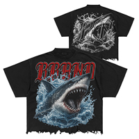 T-shirt noir oversize pour homme, imprimé graphique requin, style streetwear, col rond, manches courtes, en jersey de coton, coupe ample avec ourlet brut