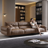 Canapé 3 places en cuir véritable au design italien moderne avec base métallique pour salon, mobilier haut de gamme pour villa
