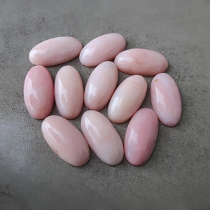 พลอยโอปอลสีชมพูแท้ทรงรีขนาดใหญ่ ขัดเงา ด้านหลังแบน สำหรับทำเครื่องประดับ มีทุกขนาด - Product Image 1