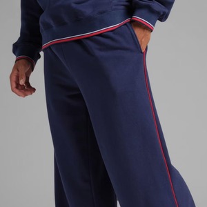 Pantalon de survêtement bleu marine pour homme avec bande latérale rouge, taille élastique, en molleton de coton décontracté, idéal pour l'automne - Product Image 3