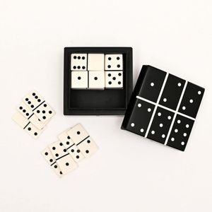 Jeu de dominos en résine noir et blanc dans une boîte carrée avec motif à pois classique pour le jeu ou la décoration, points blancs classiques et décoratifs - Product Image 1
