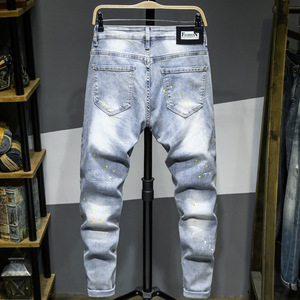 Jean slim homme en denim patchwork délavé style streetwear en coton mi-lourd pour l'automne - Product Image 2