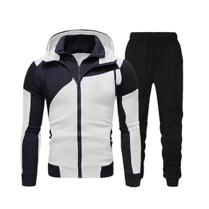 Elite men's <b>zip</b>-<b>up</b> tracksuits. Modern contrast-panel design with sharp <b>white</b> accents and comfortable tapered joggers - Product Image 1