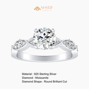 แหวนหมั้นมอสซาไนต์ทรงกลม เงินแท้ 925 ประดับเพชรด้านข้างแบบ Pave Band แหวนแต่งงาน ดีไซน์คล้ายเพชร - Product Image 6