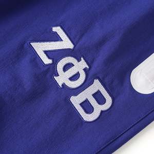 กางเกงวอร์มสีน้ำเงินรอยัลสำหรับผู้หญิง Zeta Phi Beta แต่งแถบสะท้อนแสงสีขาวที่ข้อเข่า ปักตัวอักษรกรีก - Product Image 6