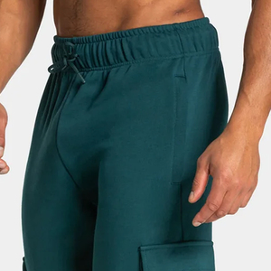 Pantalon de survêtement cargo pour homme, couleur turquoise, taille élastique avec cordon de serrage, plusieurs poches, décontracté, respirant, tissu tricoté de poids moyen - Product Image 4