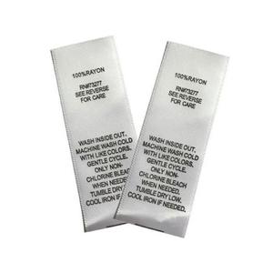 Étiquette de soin en satin blanc 30 mm rectangulaire à coudre, imprimée avec des instructions d'entretien pour vêtements RN7327 - Product Image 1