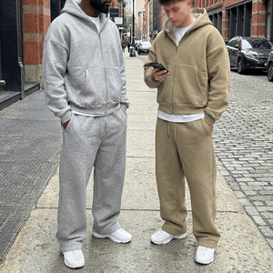 Ensemble de survêtement streetwear oversize à fermeture éclair, coupe décontractée, comprenant un sweat à capuche et un pantalon large à jambes larges, manches longues, style streetwear. - Product Image 1