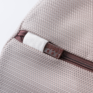 Coffee-colored double-layered cylindrical <b>laundry</b> bag with fine mesh zipper. - Product Image 4