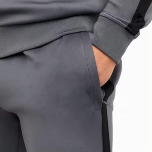 Chándal de hombre con logotipo personalizado OEM, ropa deportiva activa para correr, chándal en blanco a rayas laterales con cremallera para hombre y mujer - Product Image 6