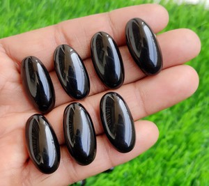 พลอยออนิกซ์สีดำธรรมชาติแบบขายส่ง รูปไข่ ทรงคาโบชอง พลอยหลวม ขัดเงา สำหรับทำเครื่องประดับ น้ำหนัก 2 กรัม ได้รับการรับรองจาก CNAS - Product Image 1