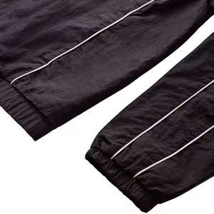 Conjunto Deportivo de 2 Piezas para Hombre, Chaqueta Cortavientos Impermeable y Resistente al Viento, Diseño de Parches, Ropa Deportiva para Correr, Estilo Urbano - Product Image 5