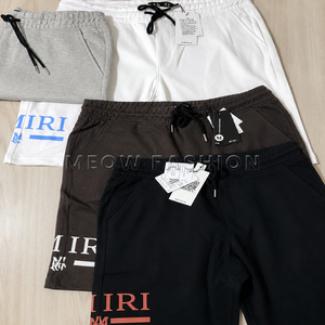 กางเกงขาสั้นผู้ชายผ้าเทอร์รี่คอตตอน 100% มีเชือกผูก เอวกลาง สีพื้น พิมพ์โลโก้ สวมใส่สบาย แห้งเร็ว ระบายอากาศได้ดี - Product Image 4