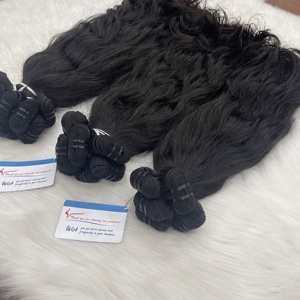 Vente en gros d'extensions de cheveux ondulés noirs bruts vietnamiens 100% meilleure qualité sans enchevêtrement grand stock disponible vague naturelle produits chauds - Product Image 1