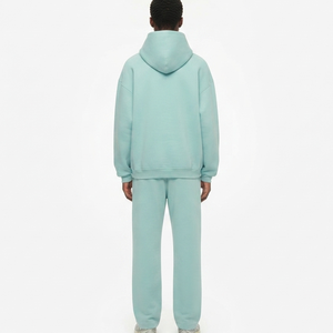 Ensemble de survêtement personnalisé en molleton de coton épais pour homme, comprenant un sweat à capuche oversize et un pantalon de survêtement à jambes larges, style streetwear, modèle vierge - Product Image 2