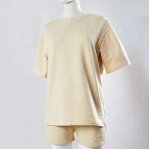 Conjunto de 2 piezas de sudadera y pantalón corto de invierno de alta calidad, estilo hip hop, hombros caídos, color liso, para mujer, a la venta. - Product Image 2