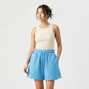 Shorts de sport amples pour femme en molleton de coton, taille mi-haute avec cordon de serrage, décontractés, coupe régulière, écologiques, respirants, pour la course - Product Image 1