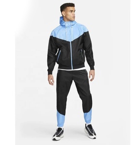 Conjunto Deportivo de Invierno para Hombre, Chaqueta Cortavientos con Capucha y Pantalones Jogger, Estampado Sólido, Logotipo Personalizado, Ropa Deportiva para Correr - Product Image 1