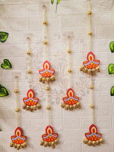 Handcrafted Pearl Diya Wall Hanging is a festive <b>decorative</b> accent designed to bring warmth tradition and elegance to <b>home</b> - Product Image 2