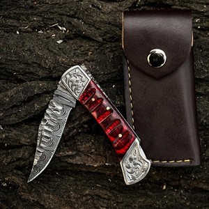 Cuchillo de bolsillo táctico plegable UA Supplies de acero de Damasco de grado industrial con punta de gota, mango rojo e incrustaciones plateadas, 3 años de garantía - Product Image 1