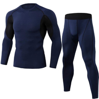 Ensemble de sport pour homme, noir uni, compression, haut à manches longues et col rond, pantalon à taille élastique, logo sur le devant, coupe sportive