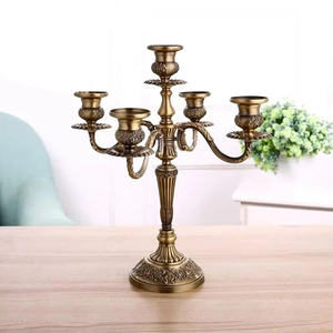 Shining gold finish five arm <b>candelabra</b> centerpiece displaying finely textured patterns, available at wholesale prices. - Product Image 3