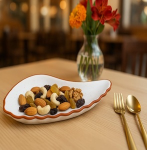 <b>Ceramic</b> Leaf-Shaped Serving <b>Plate</b> Irregular Handmade Modern Design for Snacks Dry Fruits Desserts Party Dishes & <b>Plates</b> - Product Image 1