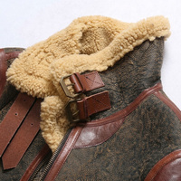 Blouson aviateur en peau de mouton fabriqué en usine pour homme, avec poches en cuir et doublure en laine, idéal pour l'hiver.