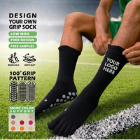 Chaussettes de football personnalisées à forte valeur ajoutée Chaussettes à prise en main d'usine Chaussettes antidérapantes