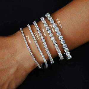 กำไลข้อมือเทนนิสโมอิสซาไนต์ขนาด 2 มม. 3 มม. 4 มม. 5 มม. 6.5 มม. เงินแท้ S925 สี D ระดับความสะอาด VVS ชุบทอง 18K ประดับเพชรเต็มวง สไตล์ฮิปฮอป เครื่องประดับสำหรับทุกเพศ - Product Image 1