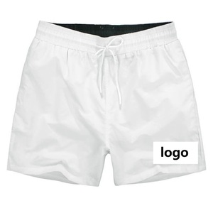 Pantalones Cortos Deportivos Casuales para Hombre, Blancos, de Secado Rápido, con Cordón Ajustable, Color Sólido, Logotipo Frontal, Cintura Media, Tejido de Poliéster - Product Image 1