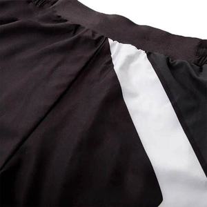 Shorts MMA pour hommes, noir et blanc, taille élastique, tissu respirant en polyester, coupe athlétique, vêtements d'arts martiaux mixtes, NOVERA INDUSTRIES - Product Image 5