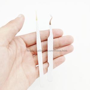 Pince à épiler professionnelle d'extension de cils pour une adhérence parfaite aux cils Pince à épiler en acier durable à pointe en caoutchouc - Product Image 1