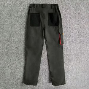 Combinaison de travail noire pour homme en tissu ripstop avec col montant, fermeture éclair et poches à bordure orange pour vêtements de neige - Product Image 6