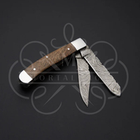 Couteau de chasse artisanal à lame en acier Damas D2 avec manche en os de chameau, couteau multifonction plein fil à lame intégrée pour l'extérieur