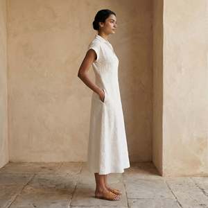<b>White</b> Ecru Embroidered Cotton Sleeveless A-Line Midi Dress For Women Featuring Lightweight Fabric Modern Style Comfortable Fit - Product Image 3