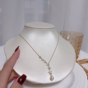 Collier de clavicule haut de gamme demi-étoile, perles d'eau douce demi-percées 7-8 mm, forme de riz, disponible en gros et au détail - Product Image 2